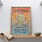 A framed sign with a list of rules for a lake house, including activities such as waking up late, jumping in the lake, taking a nap, drinking, taking a nap, drinking, feeling the breeze, enjoying the sunset, and making memories.