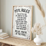a picture of a pool rules sign on a shelf