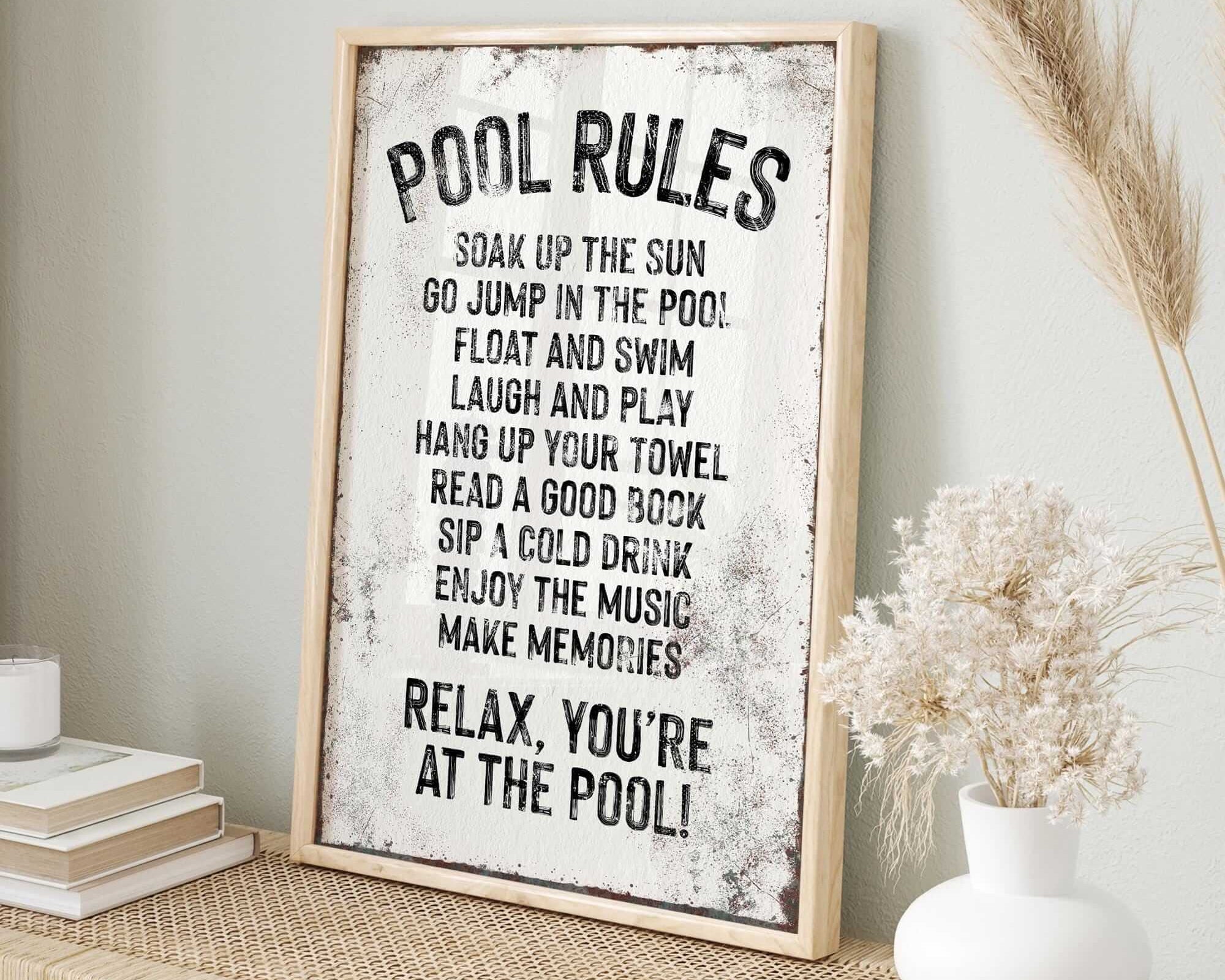 a picture of a pool rules sign on a shelf