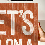 a person holding up a sign that says it&#39;s bona