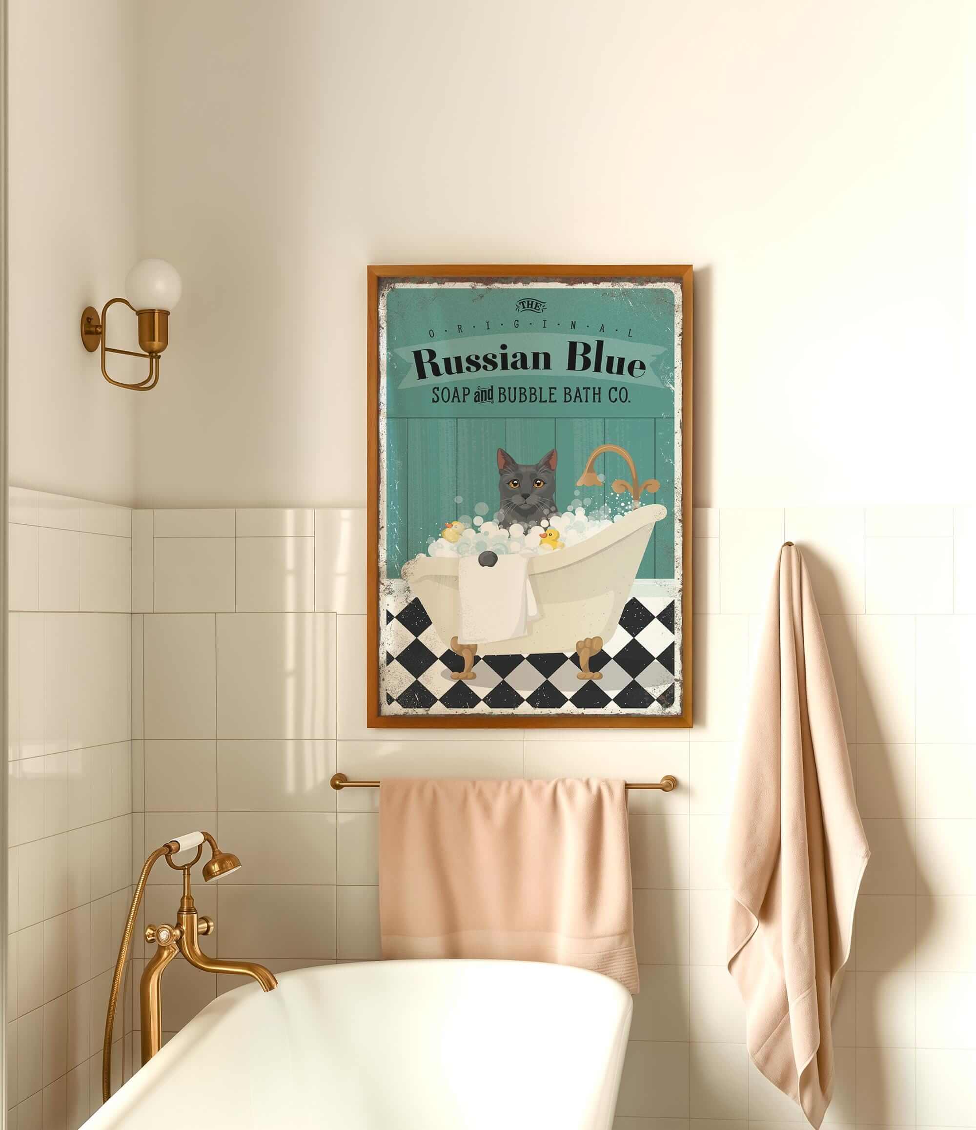 a bathroom with a framed poster of a cat in a bathtub, a white bathtub, and a towel rack.