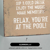a sign that reads relax you&#39;re at the pool