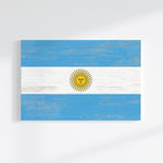 the flag of argentina painted on a white wall
