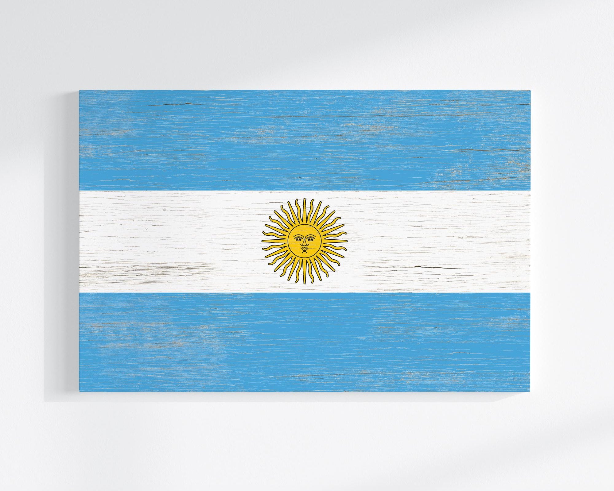 the flag of argentina painted on a white wall