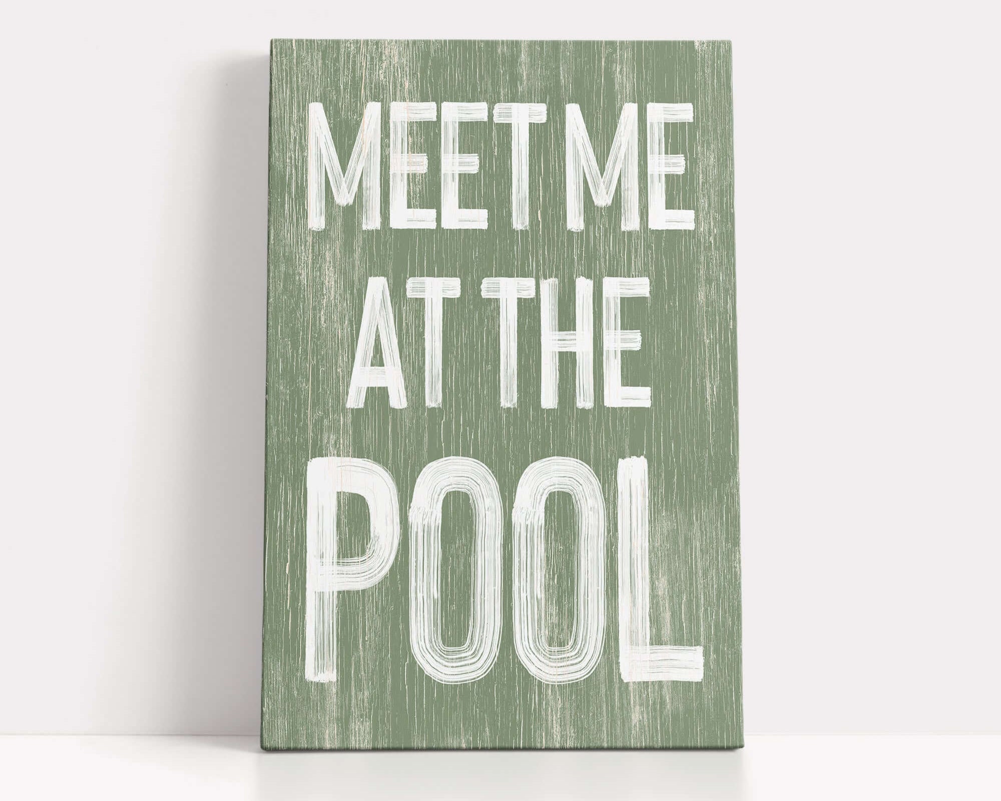 a green sign that says meet me at the pool