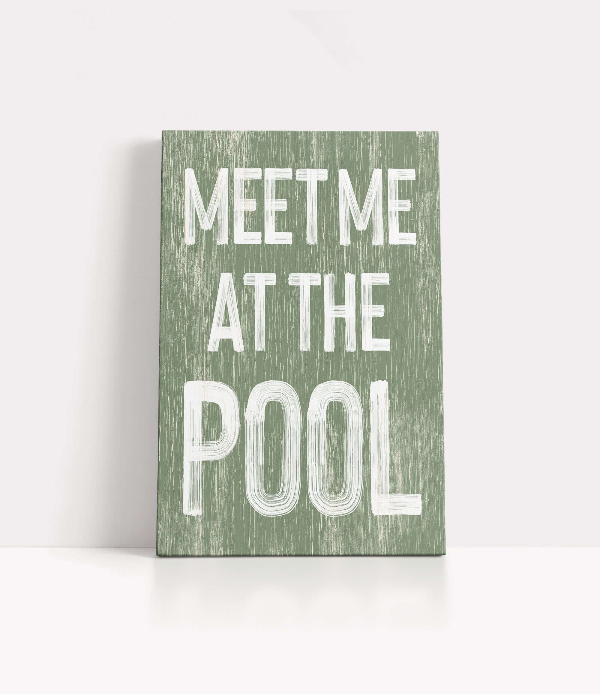 a green sign that says meet me at the pool