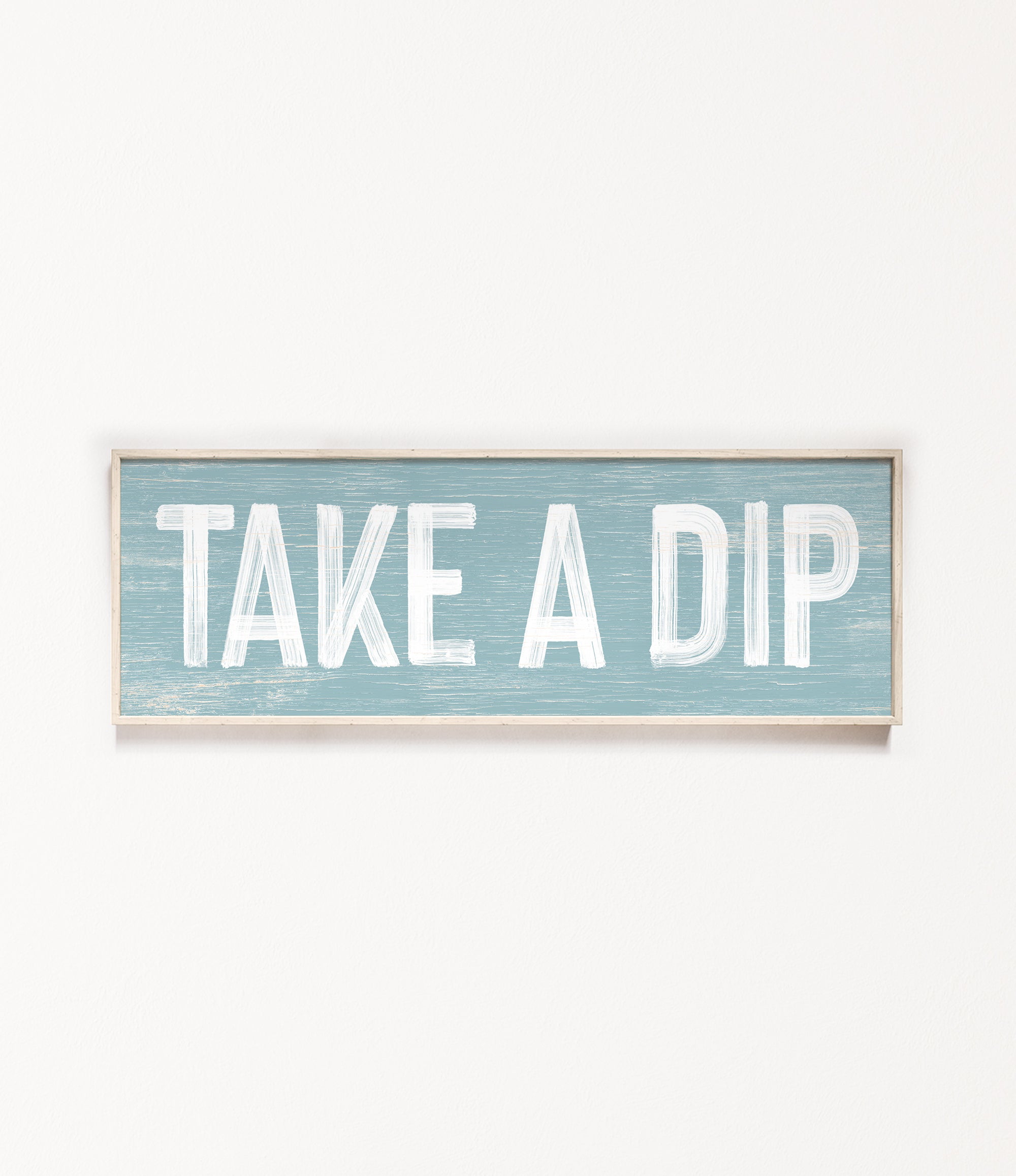 a wooden sign that says take a dip