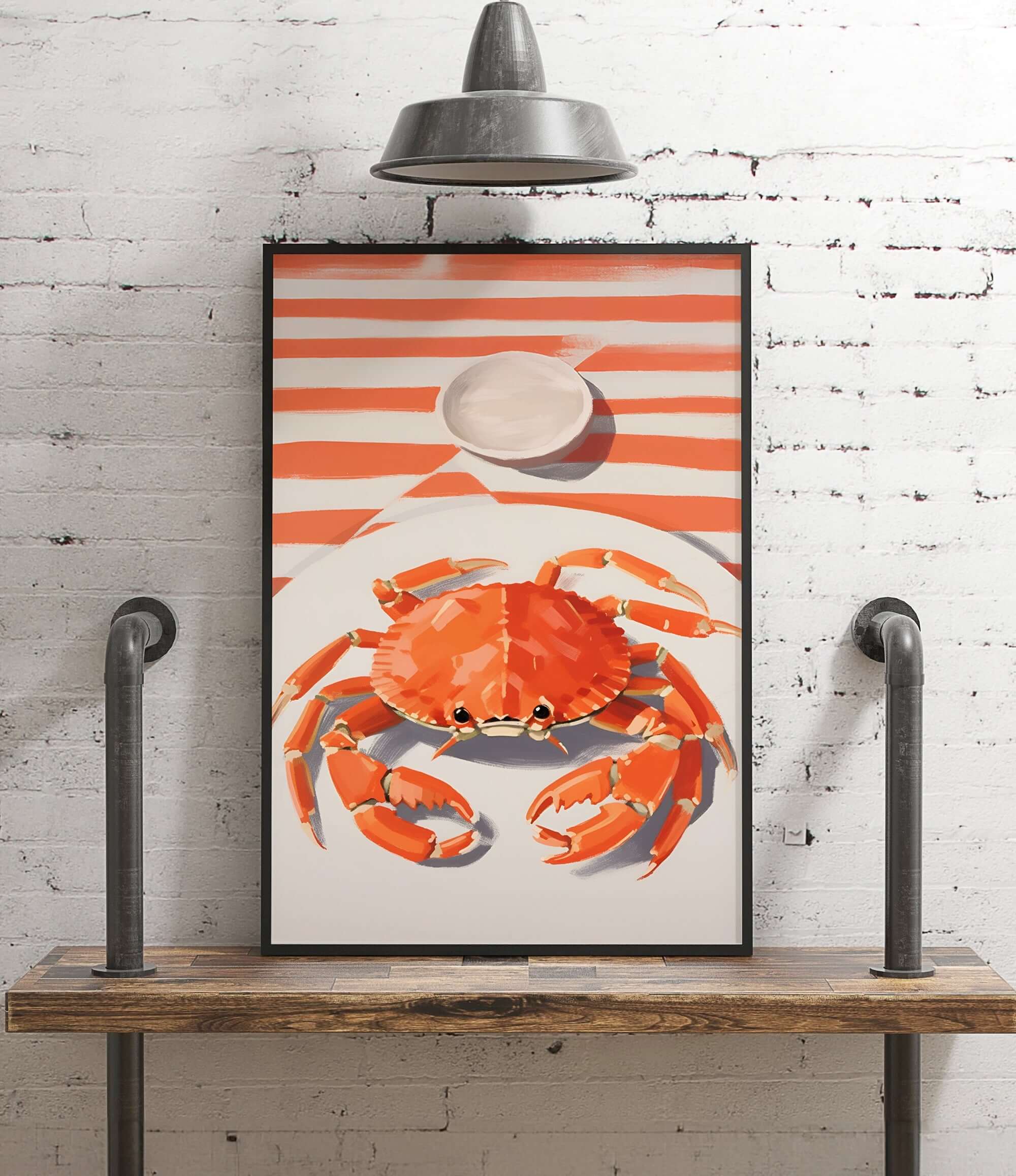 A framed painting of a crab is displayed on a wooden shelf against a white brick wall, with a light fixture above it.
