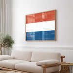 a living room with a white couch and a wooden coffee table
