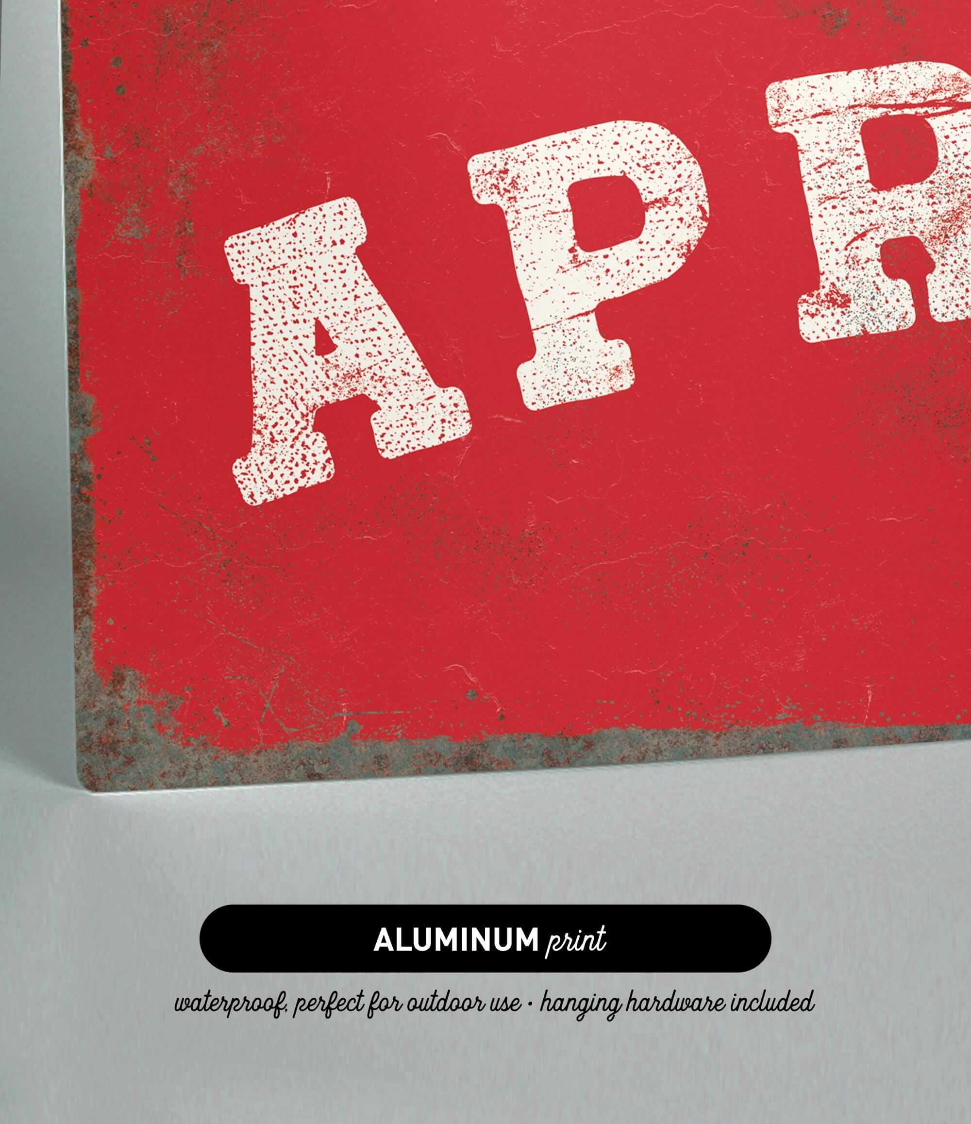 The image is an aluminum print with a red background and the word "APR" in white text.