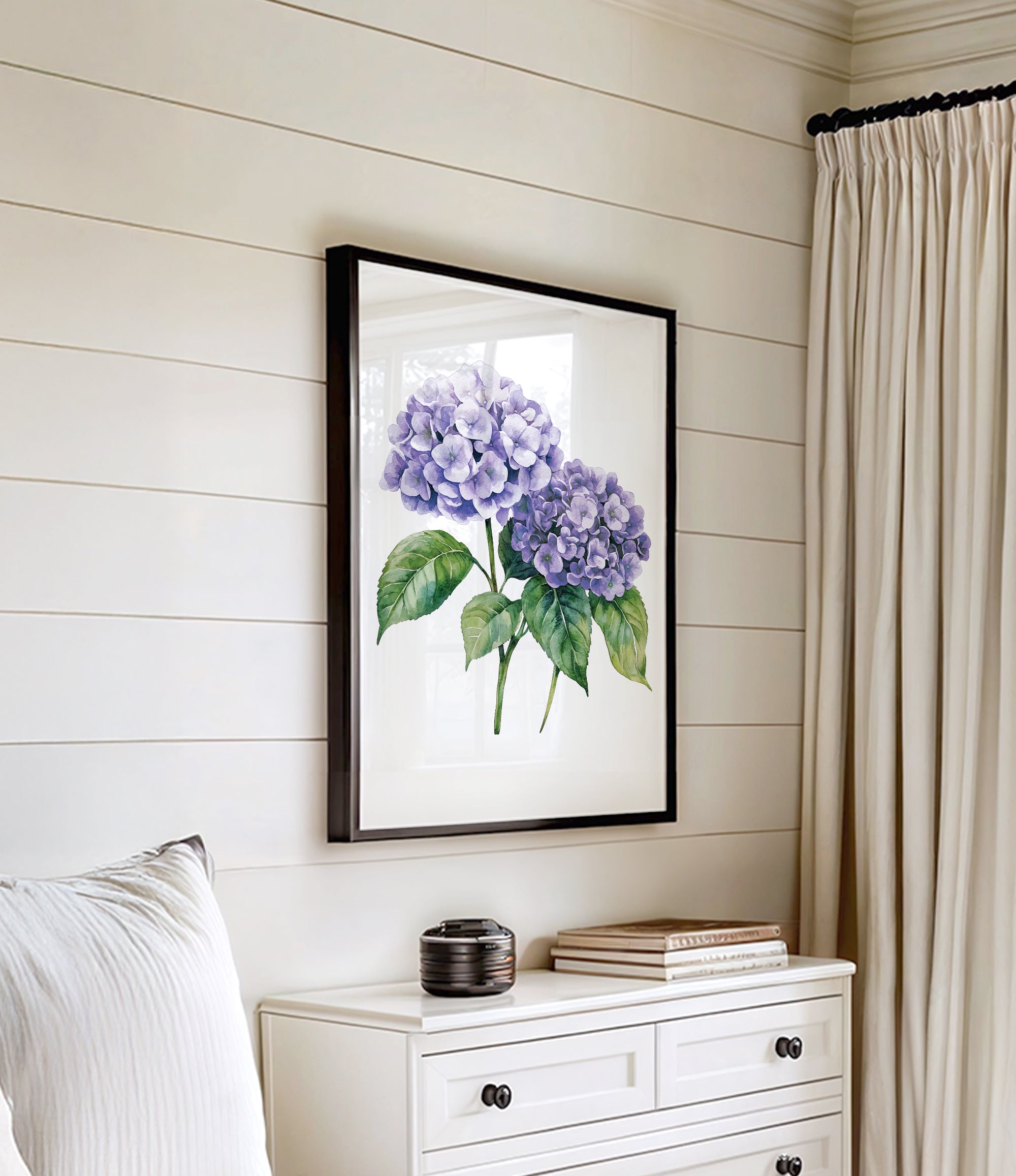a white dresser with a framed picture of purple hydrangeas hanging on the wall above it.
