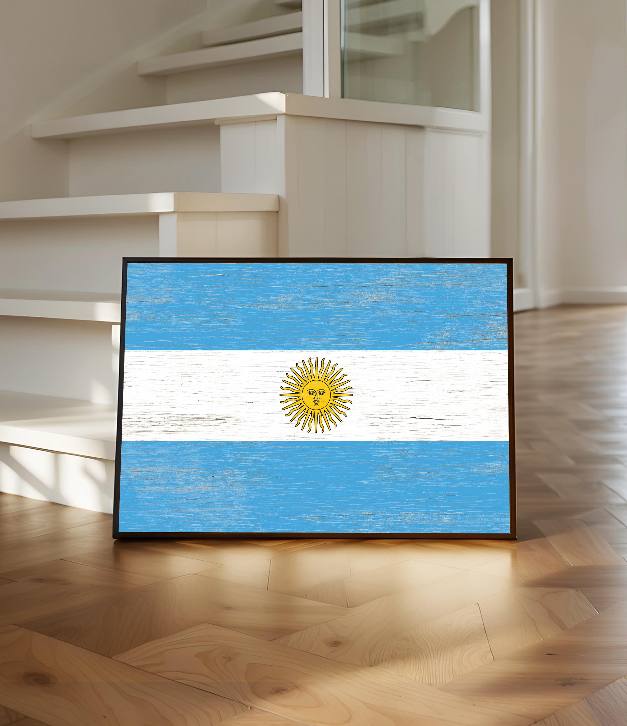 a picture of the flag of argentina on a wooden floor