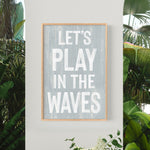 a sign that says let&#39;s play in the waves