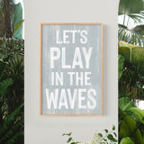 a sign that says let&#39;s play in the waves