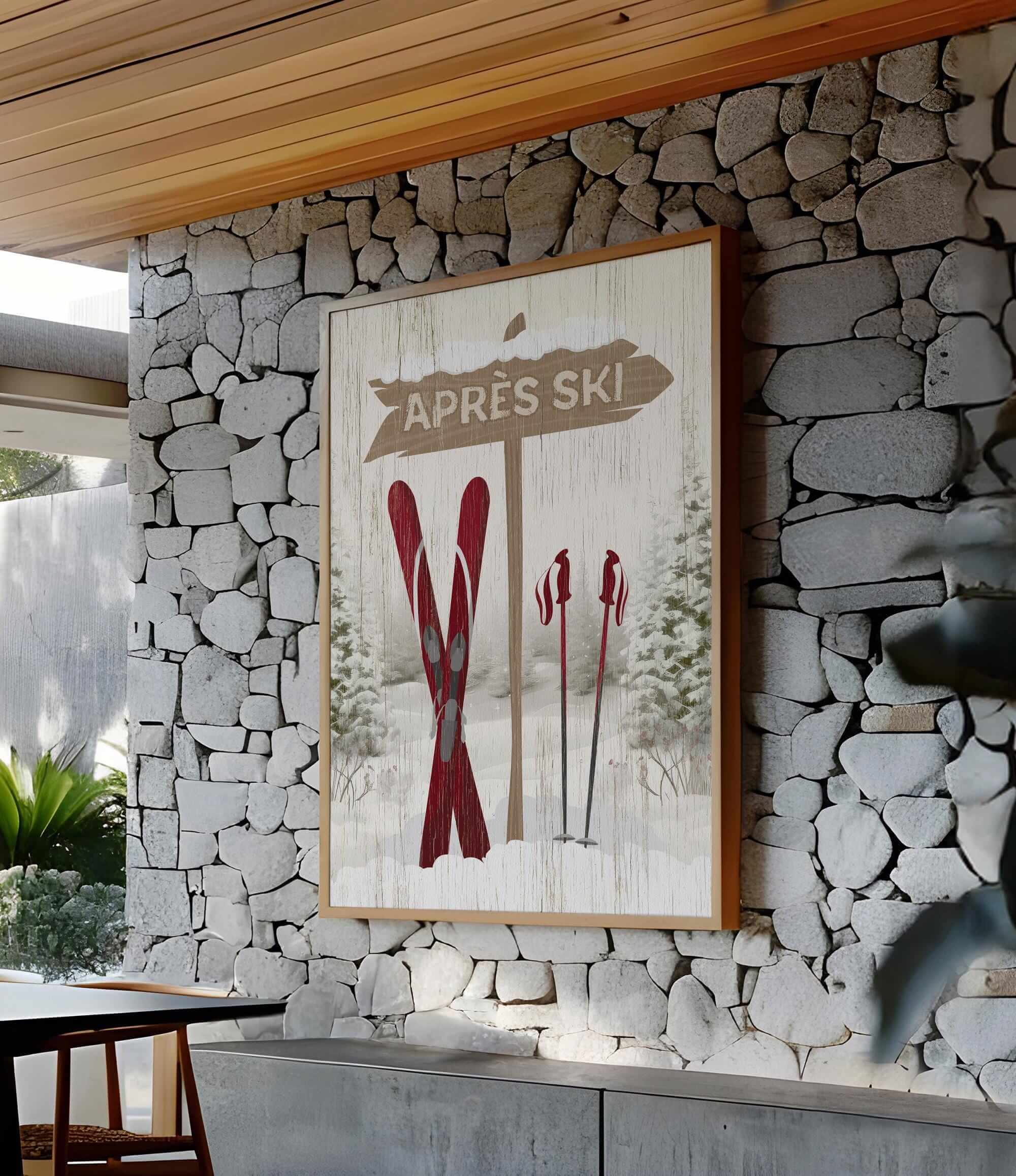 a picture of a ski lodge hangs on a stone wall