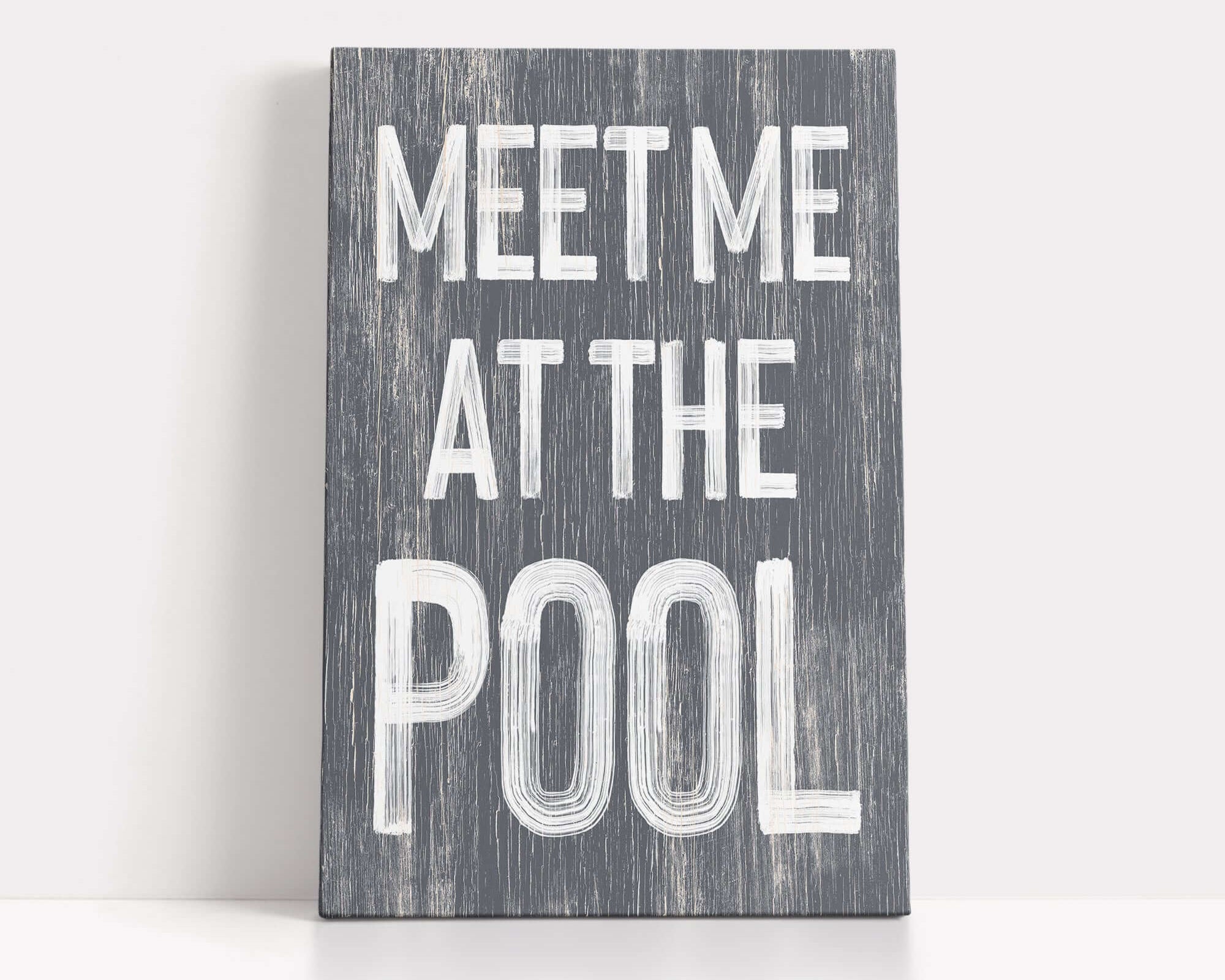 a wooden sign that says meet me at the pool