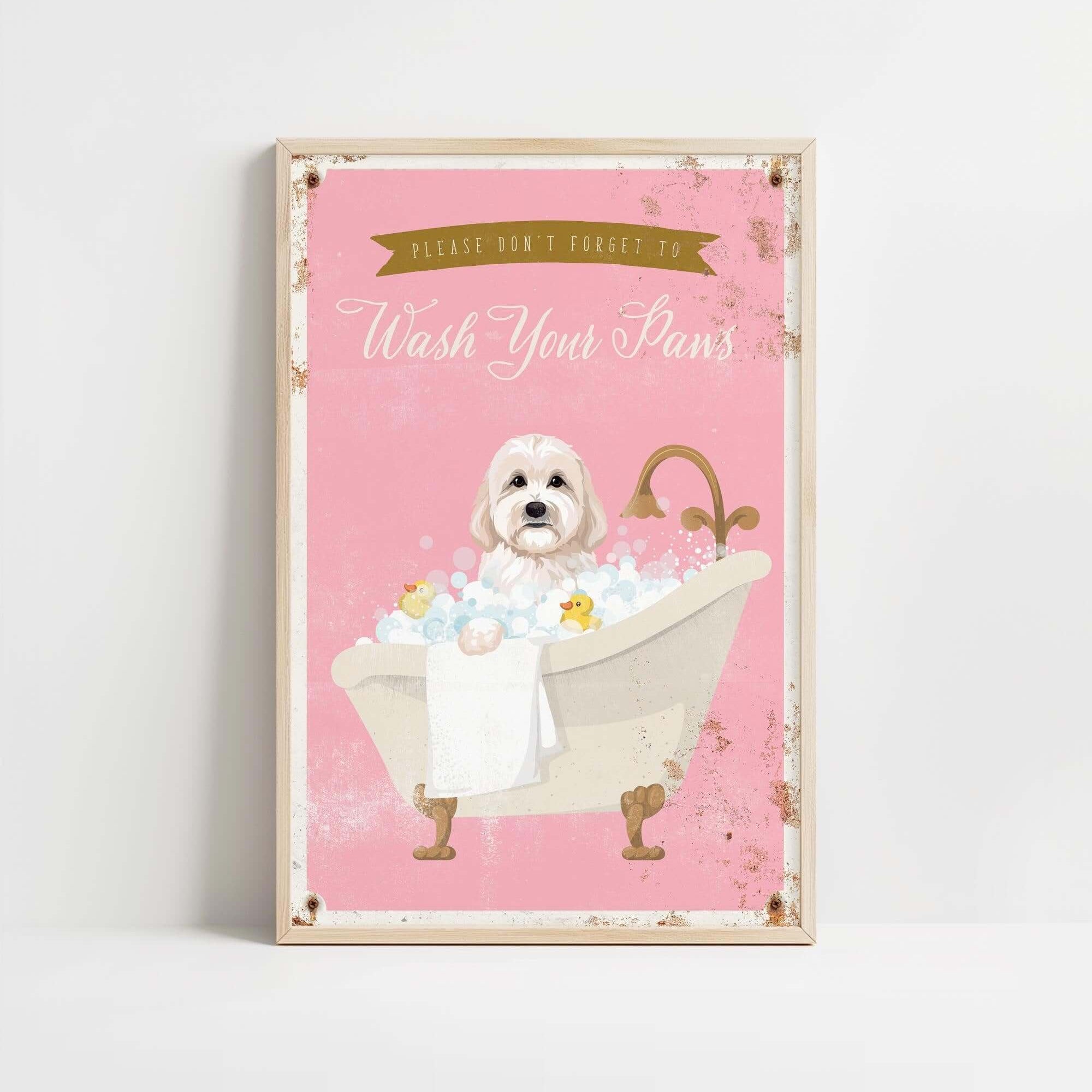 A framed poster with a cute white dog sitting in a bathtub filled with bubbles, accompanied by the text "Please don't forget to wash your paws".