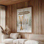 a living room with a white couch and a painting on the wall
