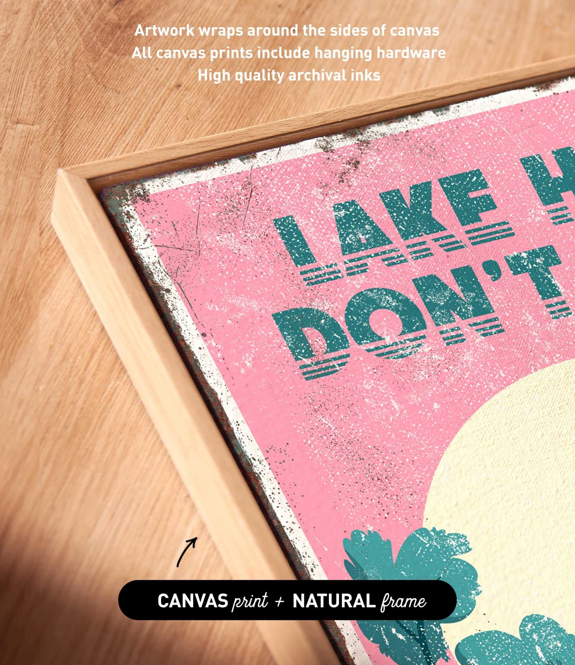 The image is a framed print with a pink background and the text "LAKES DON'T T" printed on it.