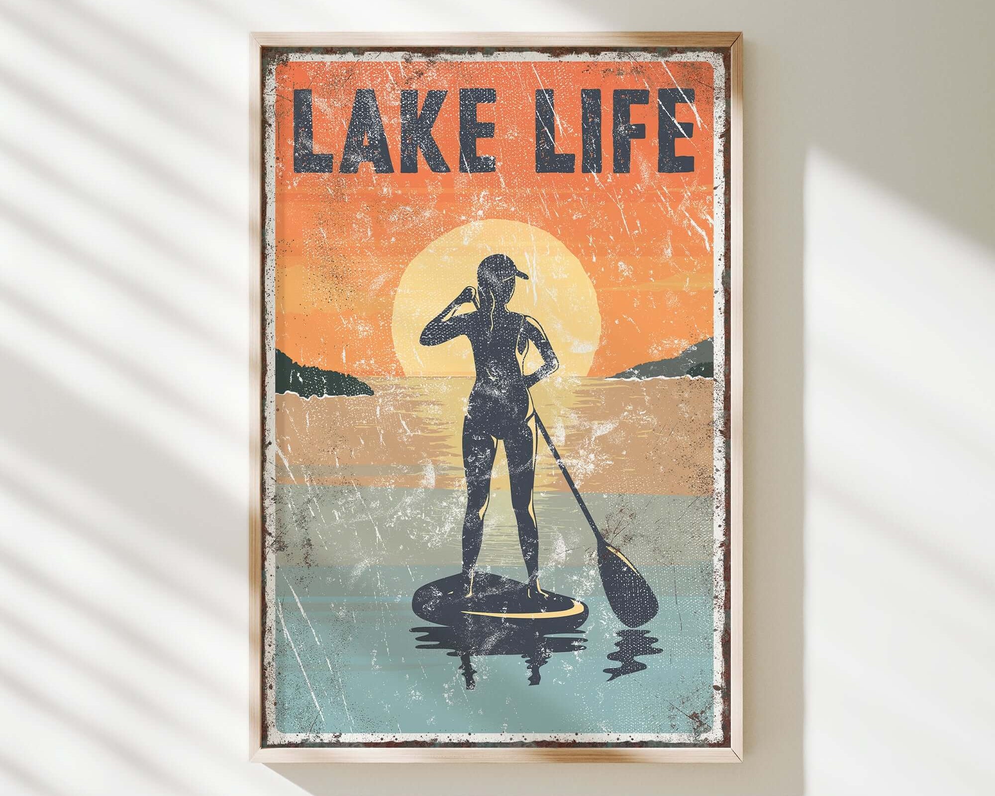 a man standing on a paddle board in the water