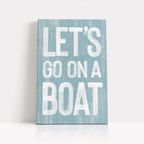 a wooden sign that says let&#39;s go on a boat