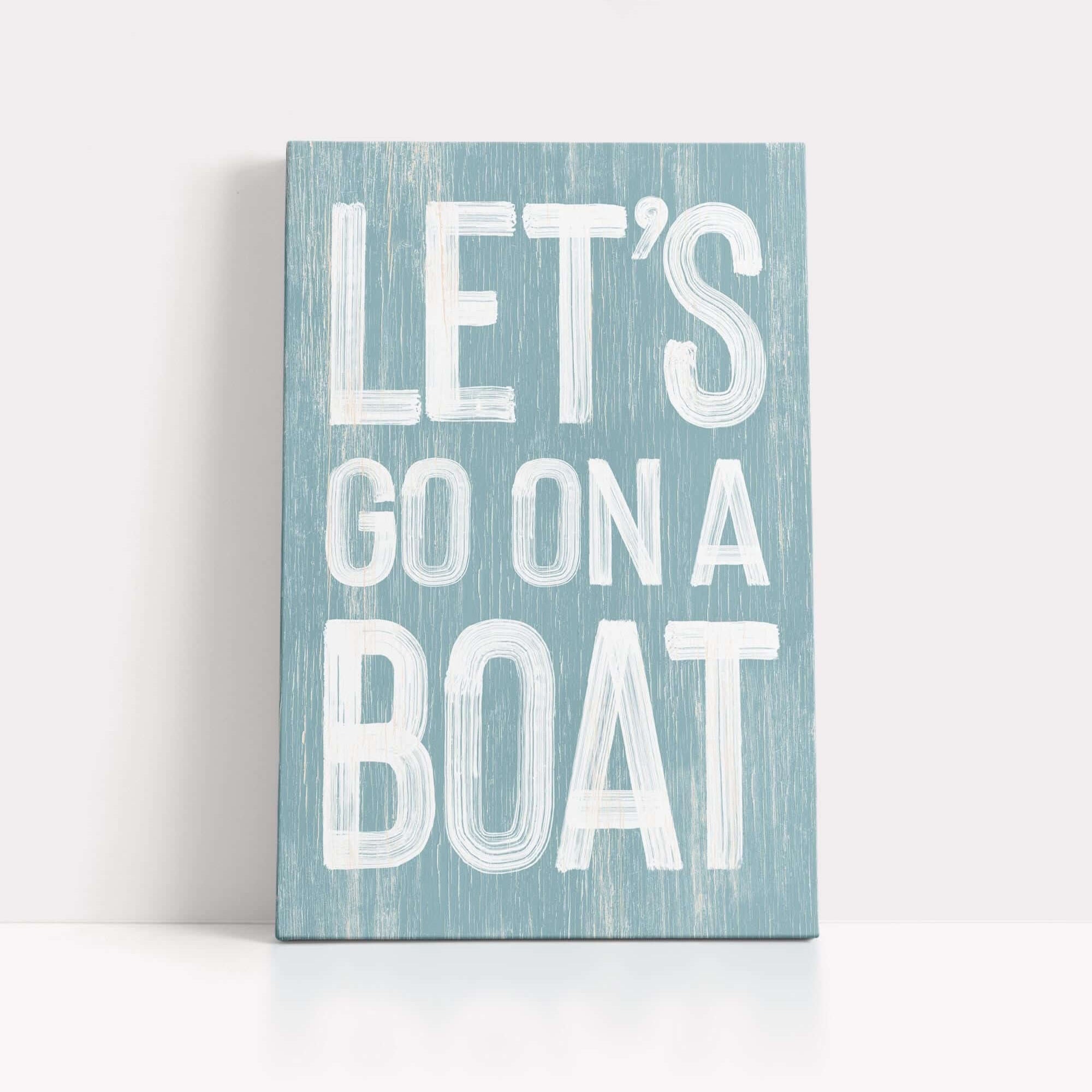 a wooden sign that says let's go on a boat