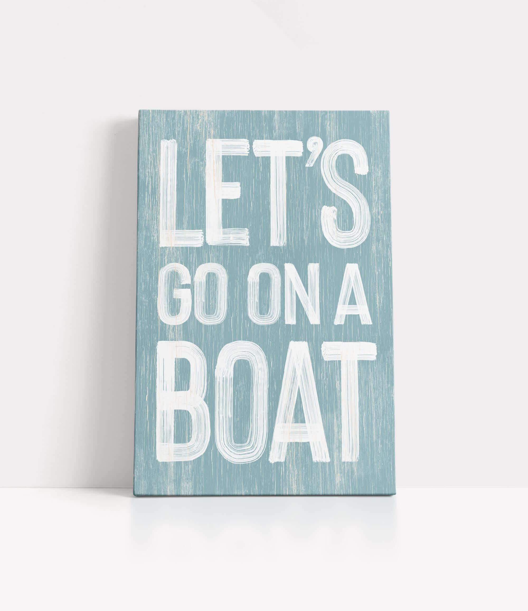 a wooden sign that says let&#39;s go on a boat