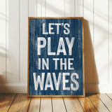 a wooden sign that says let&#39;s play in the waves
