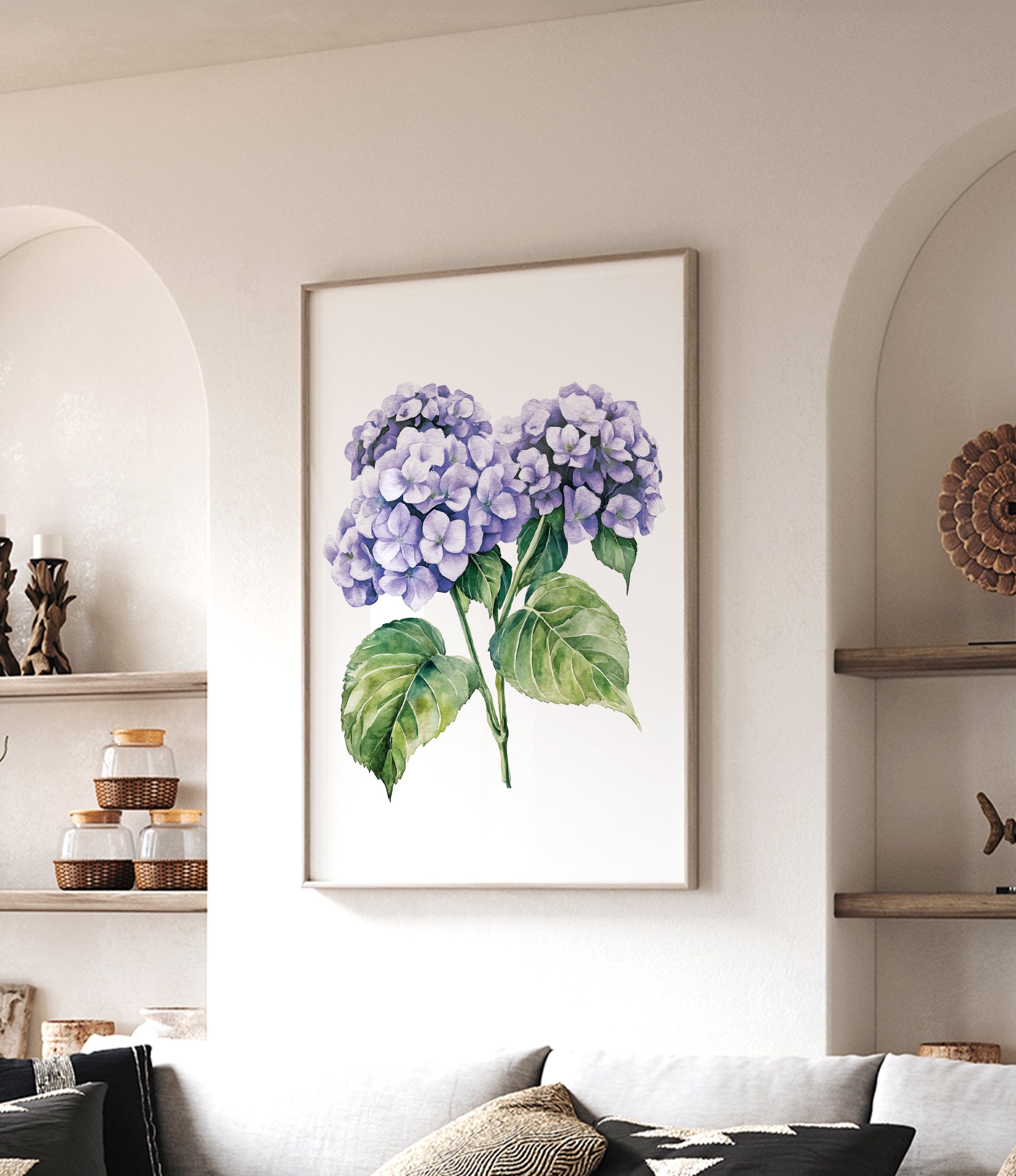 a framed painting of purple hydrangeas hanging on a wall in a living room.