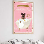 A framed poster with a cartoon image of a German Shepherd dog sitting in a bathtub filled with bubbles, accompanied by the text "Please don't forget to wash your paws".