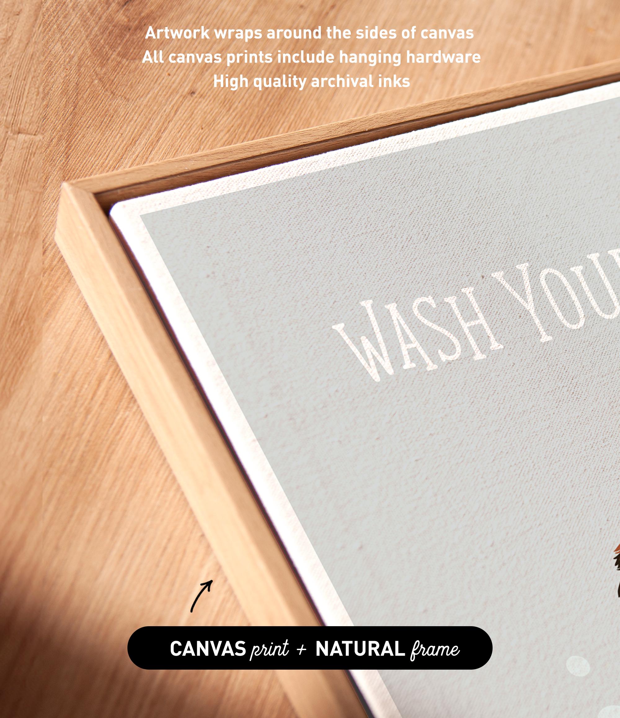a wooden surface with a framed piece of artwork that has the text "WASH YOURS" printed on it.