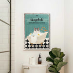 a bathroom with a toilet and a poster on the wall