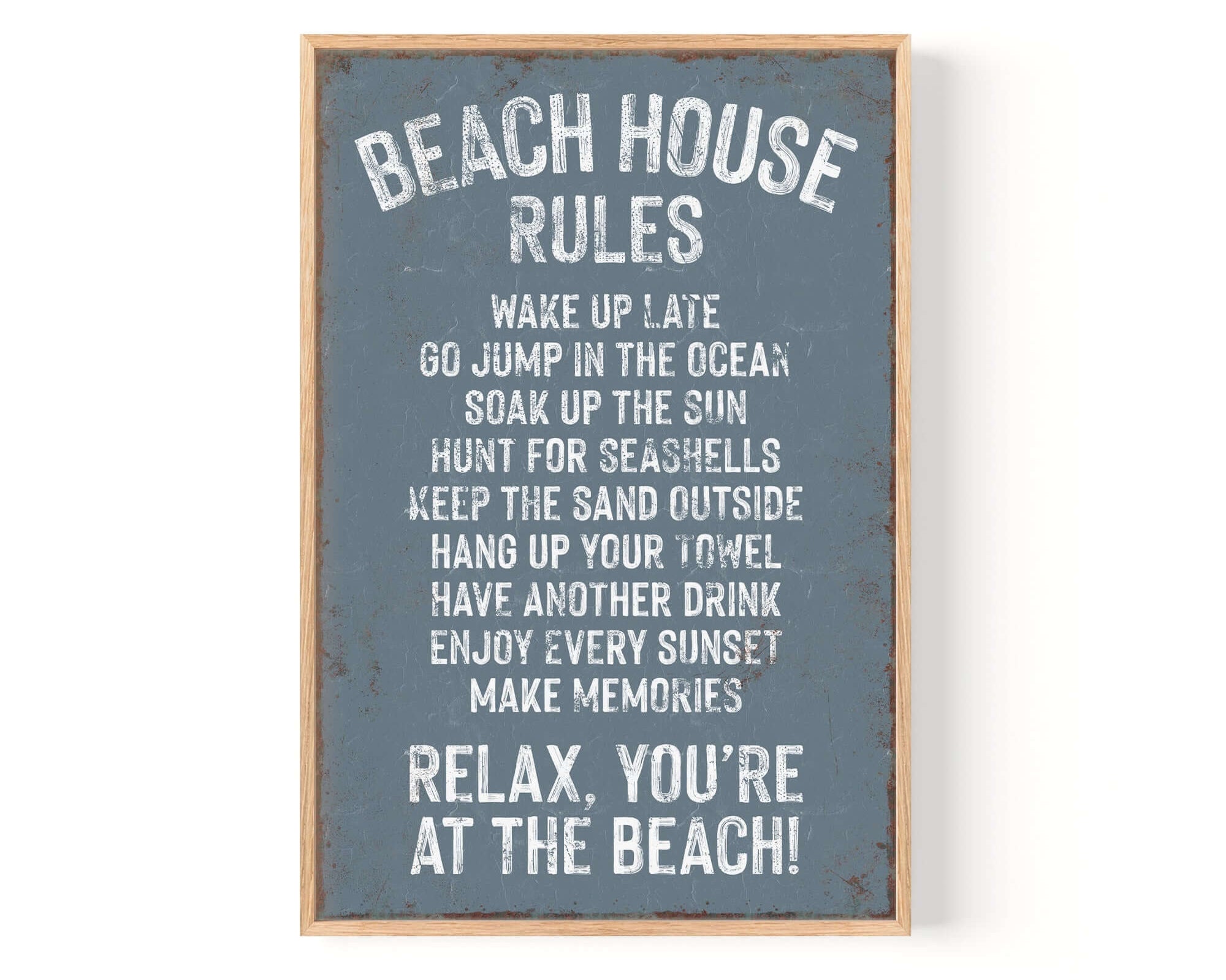 The Beach House Rules Sign, Rusted Edge, Harbor Blue, features playful beach activities in white text on a blue background—perfect as vintage wall art for adding unique decor to your home.