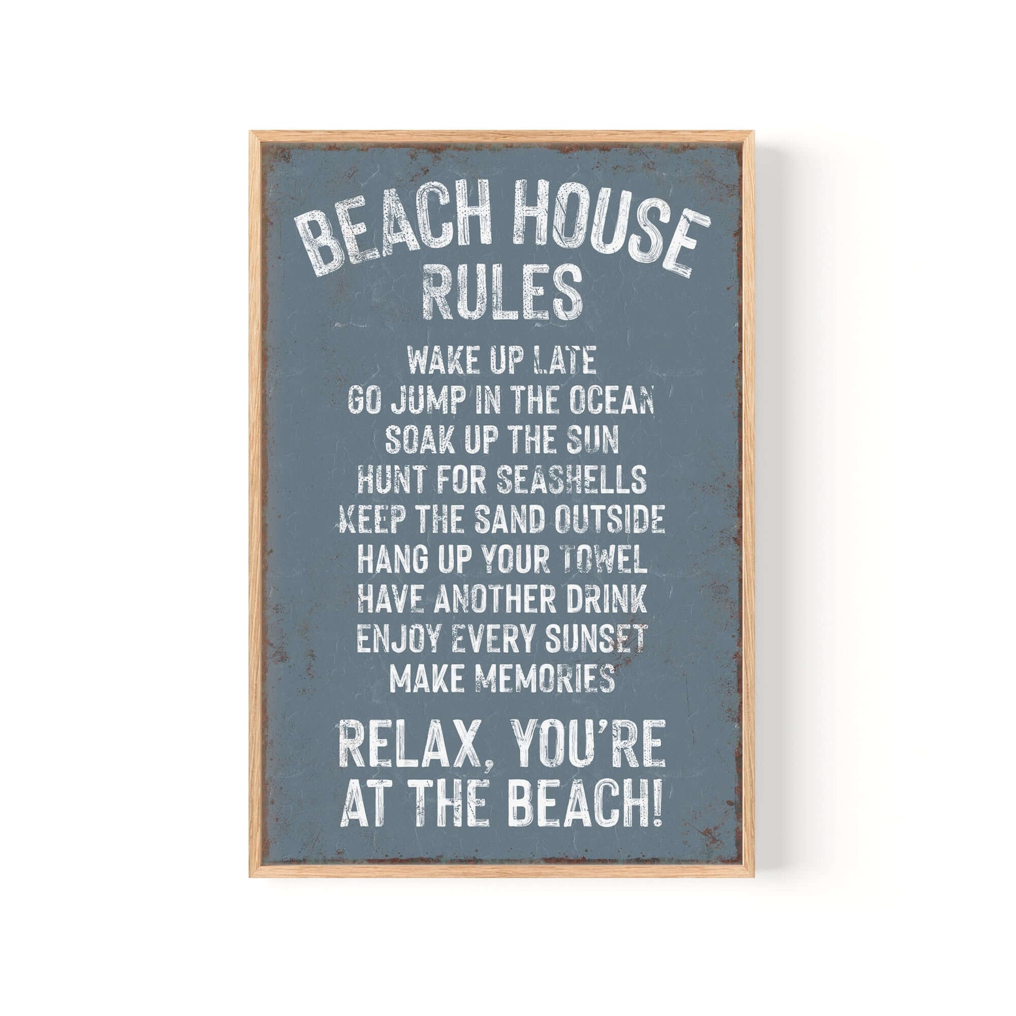 The Beach House Rules Sign, Rusted Edge, Harbor Blue, features playful beach activities in white text on a blue background—perfect as vintage wall art for adding unique decor to your home.