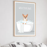 a framed poster with a cartoon illustration of a dog sitting in a bathtub filled with bubbles, with the text "WASH YOUR PAWS" written above it.