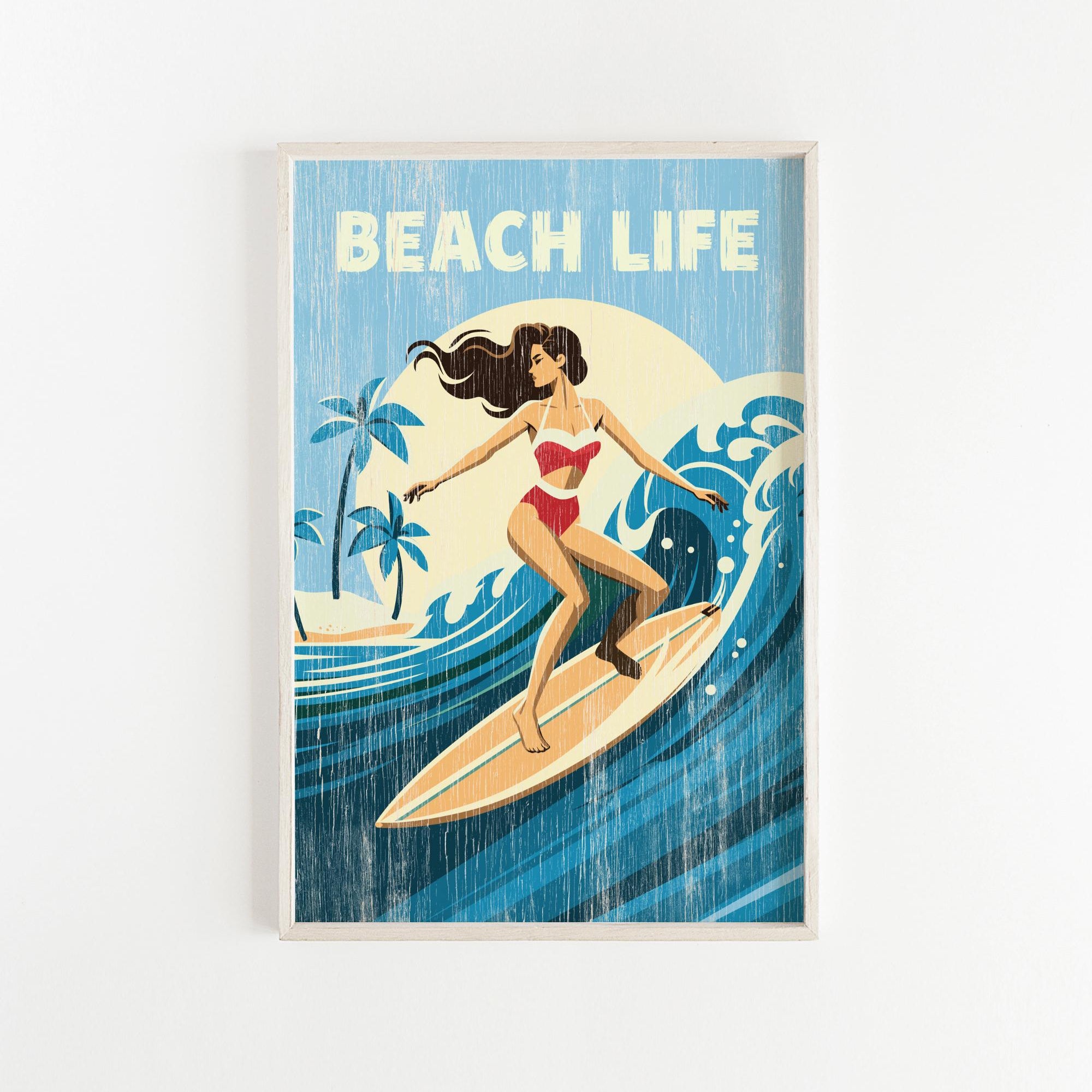 A framed illustration of a woman surfing on a wave, with the text "BEACH LIFE" prominently displayed.