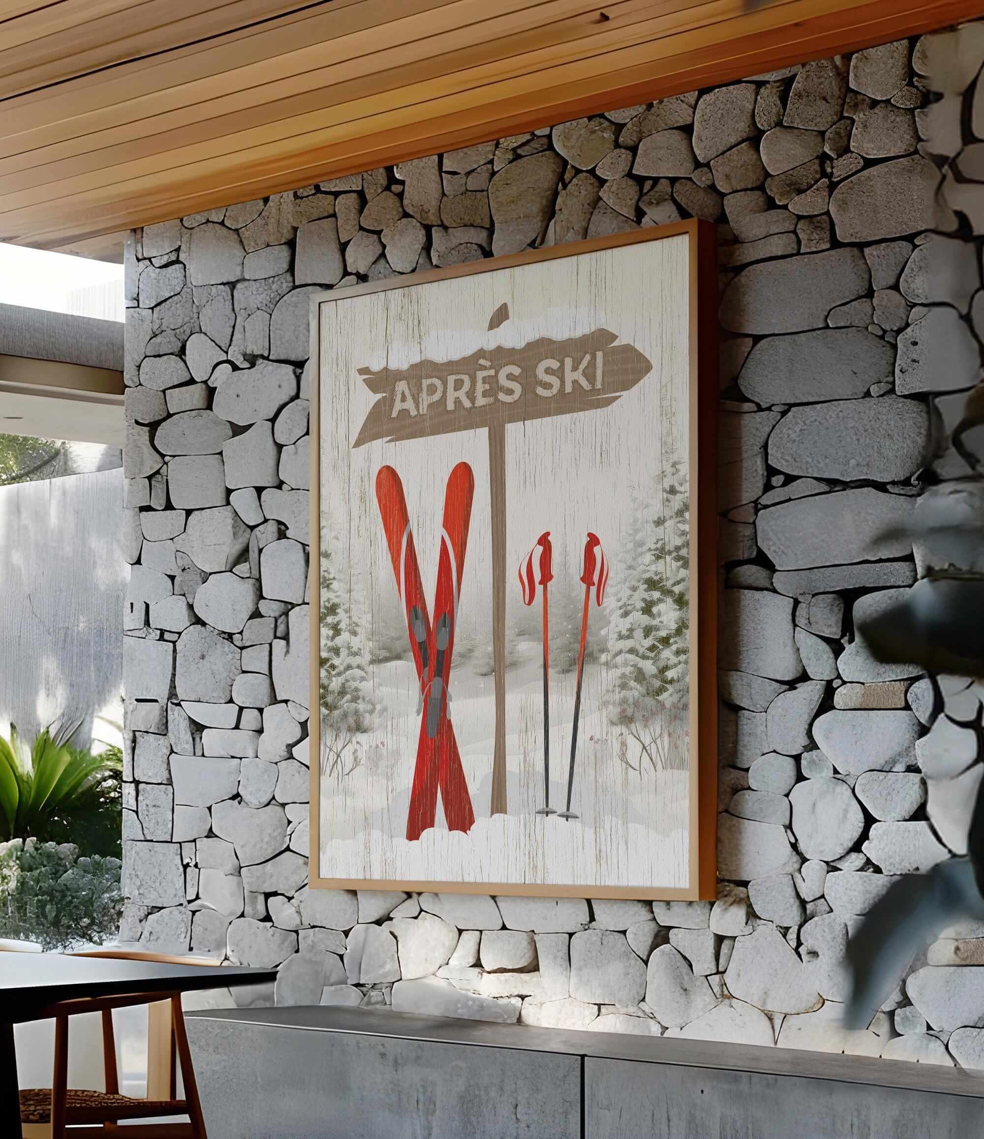 a picture of a ski lodge hangs on a stone wall