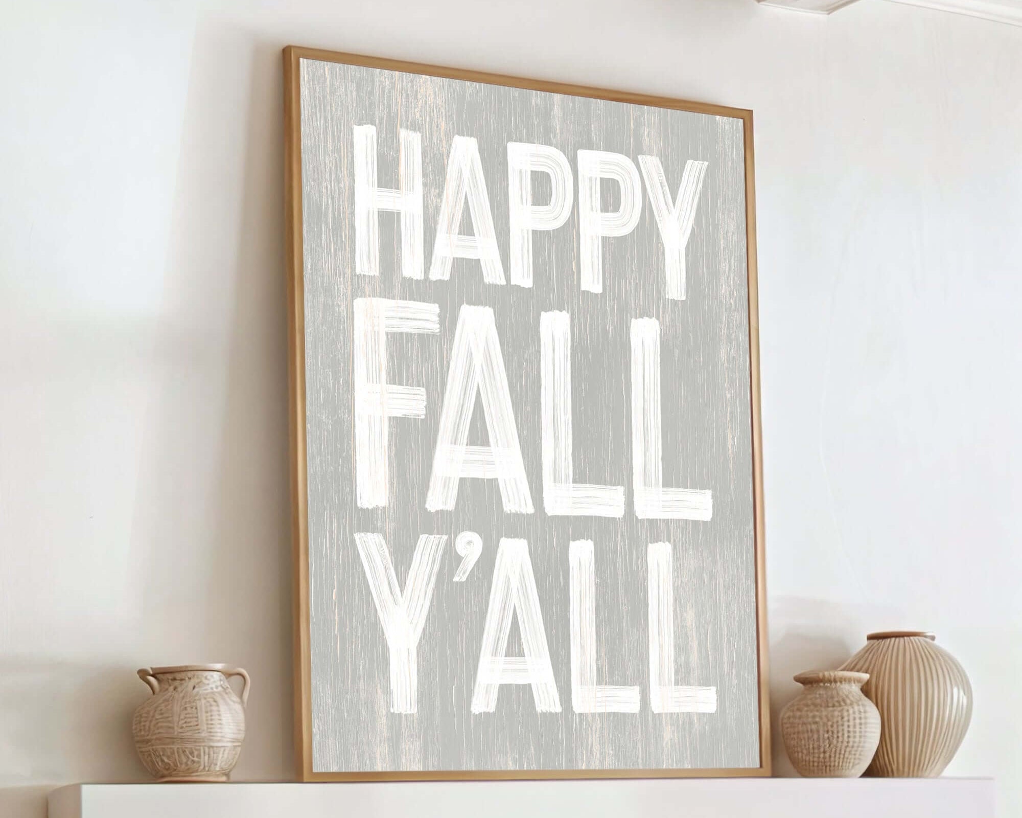 a picture of a happy fall y'all on a fireplace mantel
