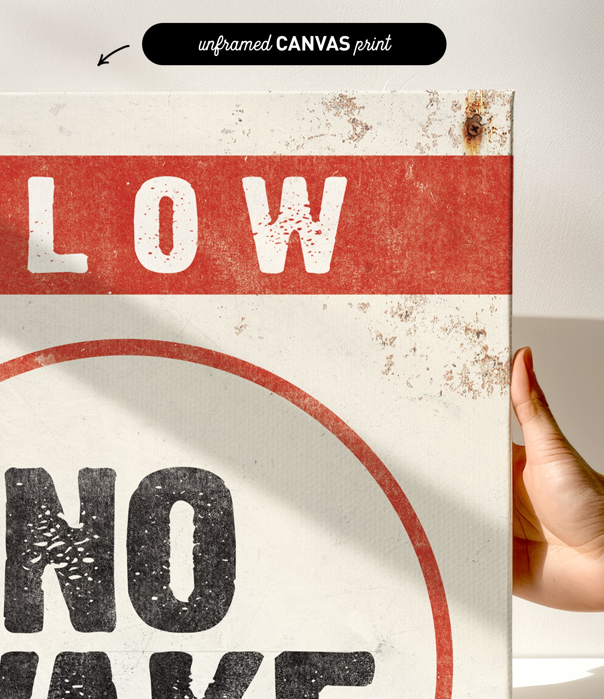 a hand holding a sign that says slow no wave