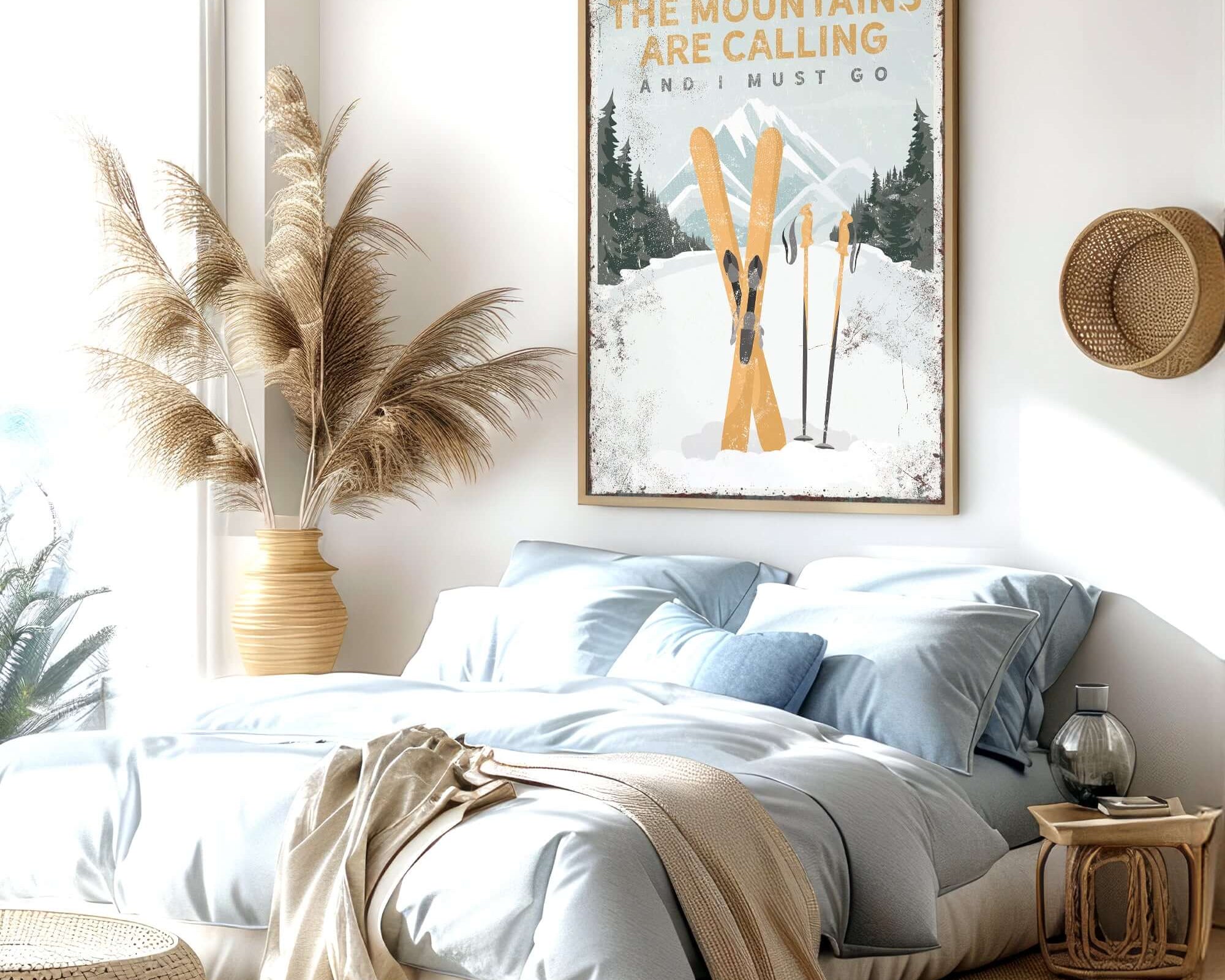 a bedroom with a large poster above the bed
