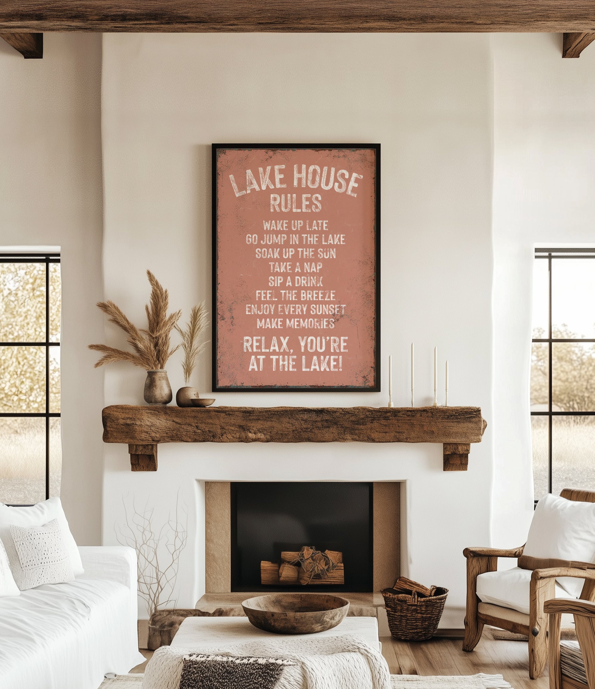 a cozy living room with a rustic fireplace, a wooden mantel, and a framed sign that reads "LAKESHORE RULES" in a vintage style.