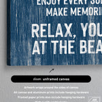 A close-up of the Beach House Rules Sign, a blue painted wood piece with white nautical text, unframed and perfect as coastal wall art or charming beach house décor.