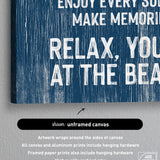 A close-up of the Beach House Rules Sign, a blue painted wood piece with white nautical text, unframed and perfect as coastal wall art or charming beach house décor.