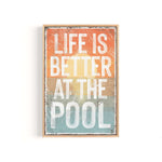 a sign that says life is better at the pool