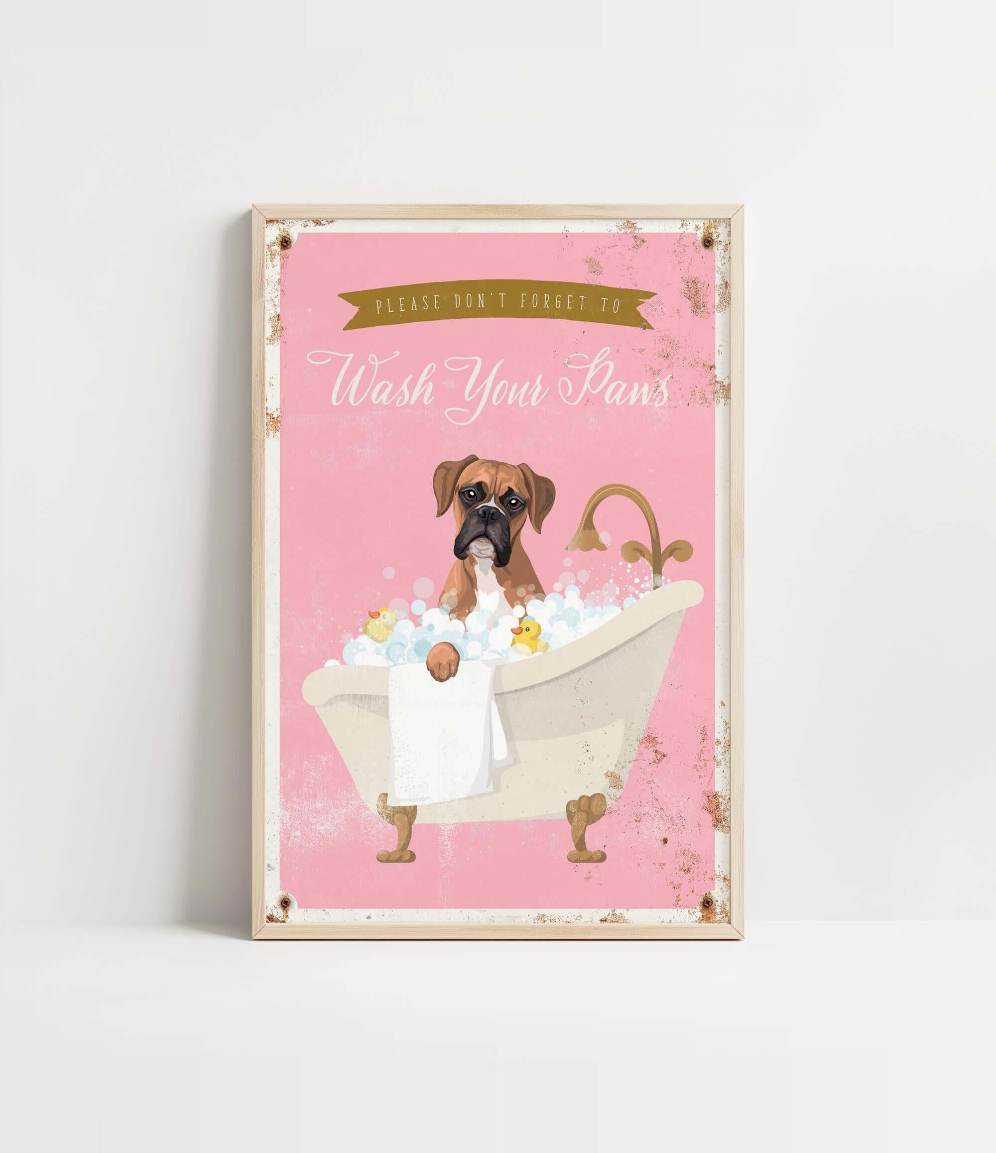 A framed poster with a cartoon image of a dog sitting in a bathtub filled with bubbles, accompanied by the text "Please don't forget to wash your paws".