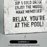 a sign that reads relax you&#39;re at the pool