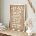a picture of a pool rules sign on a shelf