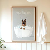 A framed poster with a cartoon image of a dog sitting in a bathtub, surrounded by bubbles, with the text "WASH YOUR PAWS" displayed above it.