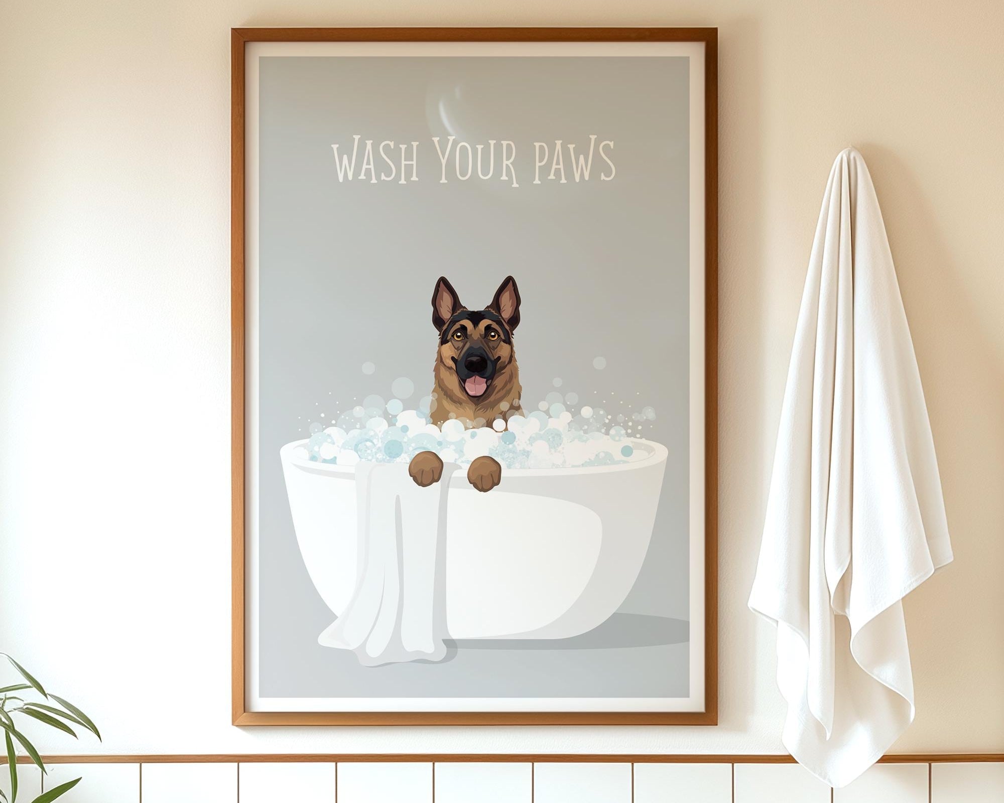A framed poster with a cartoon image of a dog sitting in a bathtub, surrounded by bubbles, with the text "WASH YOUR PAWS" displayed above it.