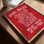 a red sign sitting on top of a wooden table